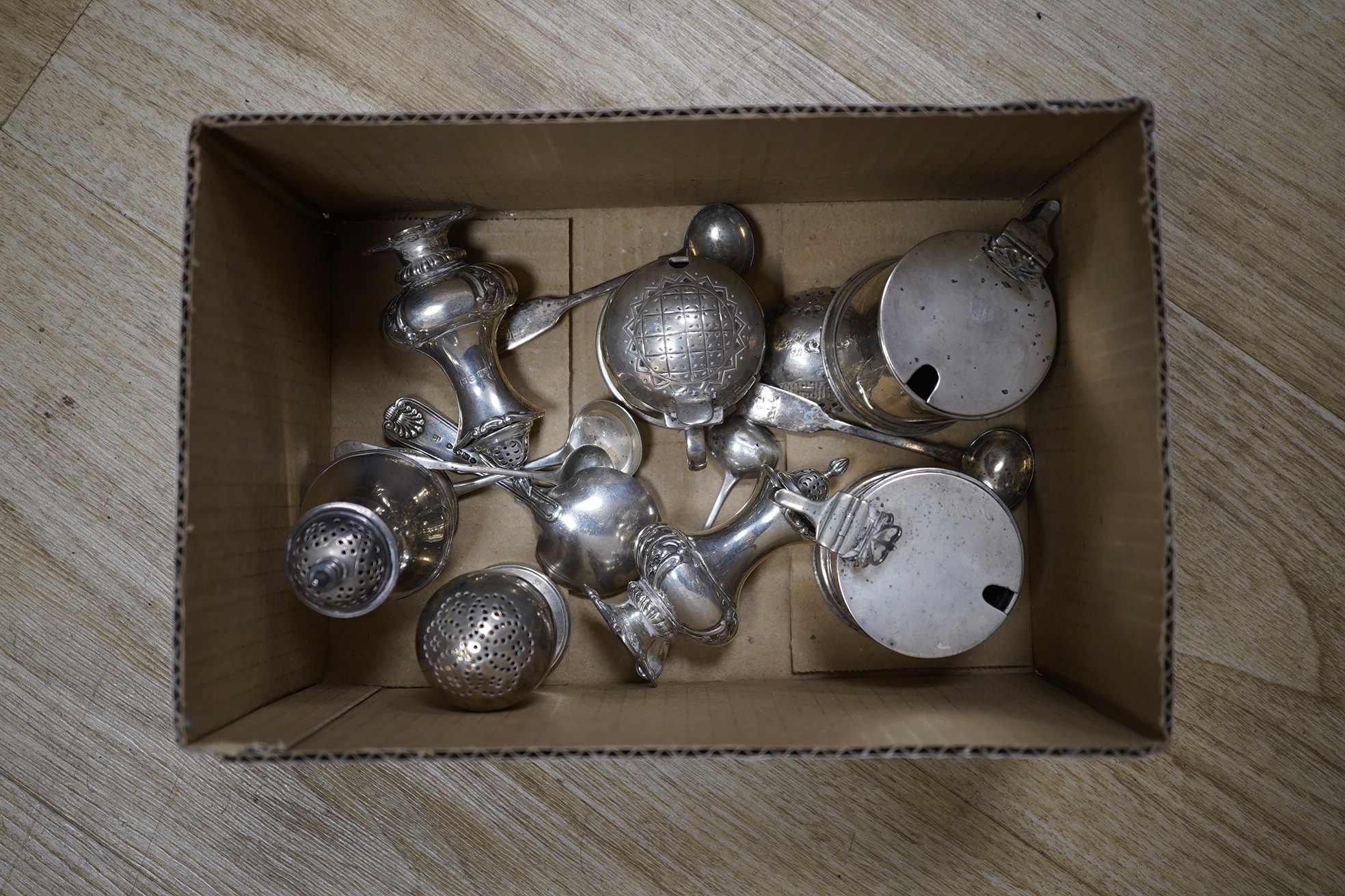 Sundry small silver including a pair of Edwardian silver drum mustards, London, 1907/8, 73mm, a Georgian pepperette, an Emes & Barnard pepperette, a Liberty & Co mustard pot, two other pepperettes and seven other items.